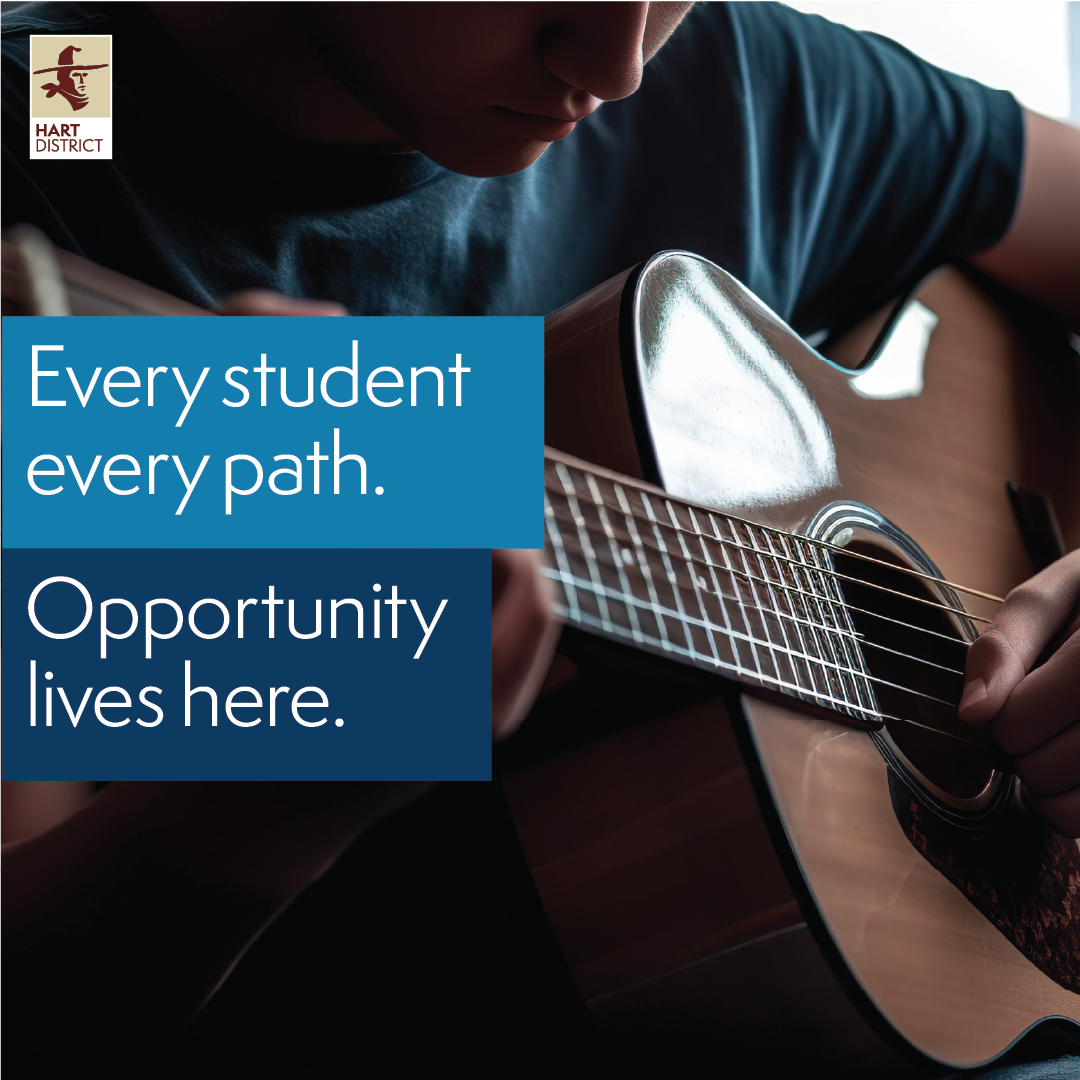A teenager in a blue shirt plays an acoustic guitar with text overlay that reads, Every student every path. Opportunity lives here.