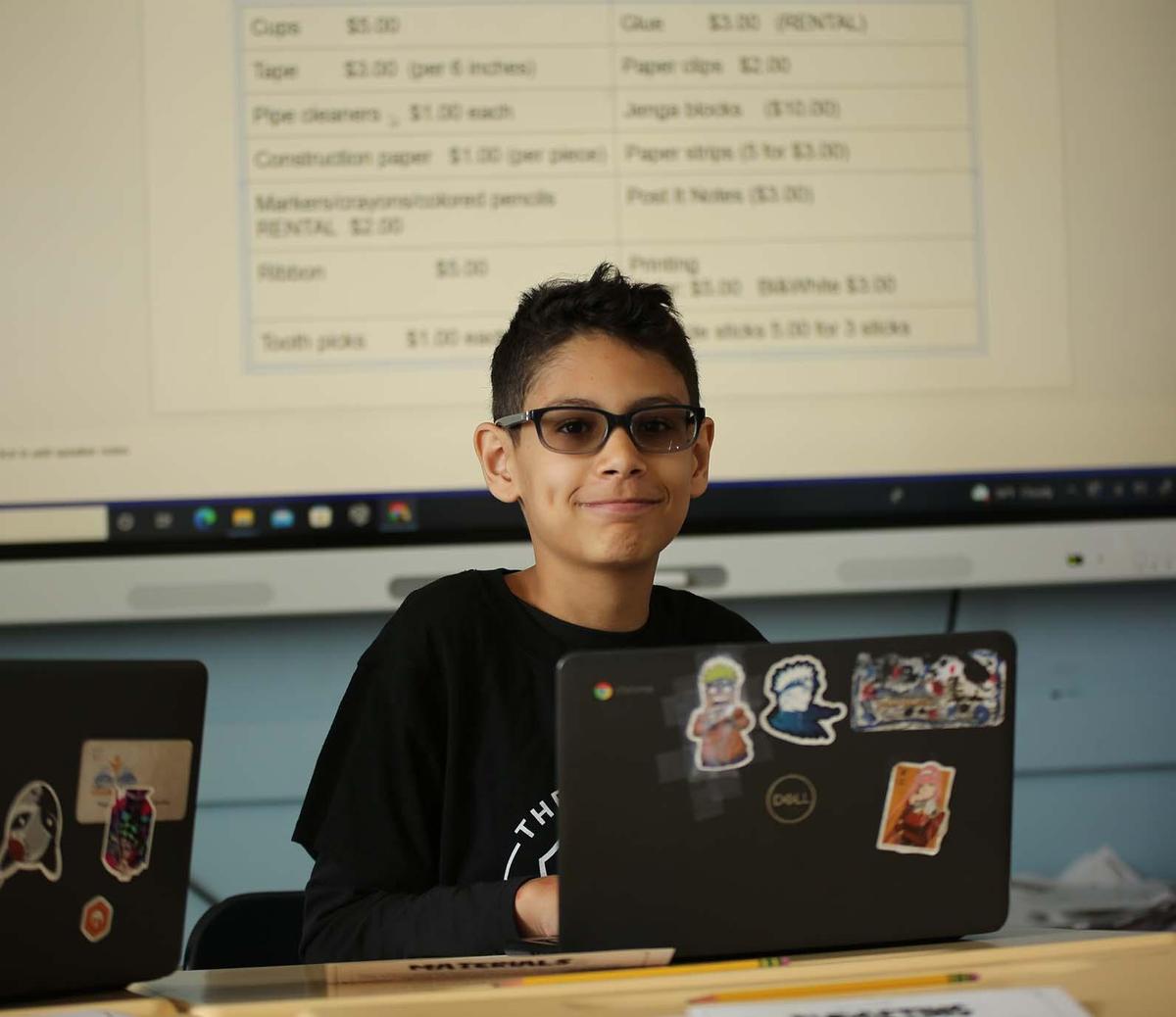 Noble Academy Columbus student uses a laptop in class