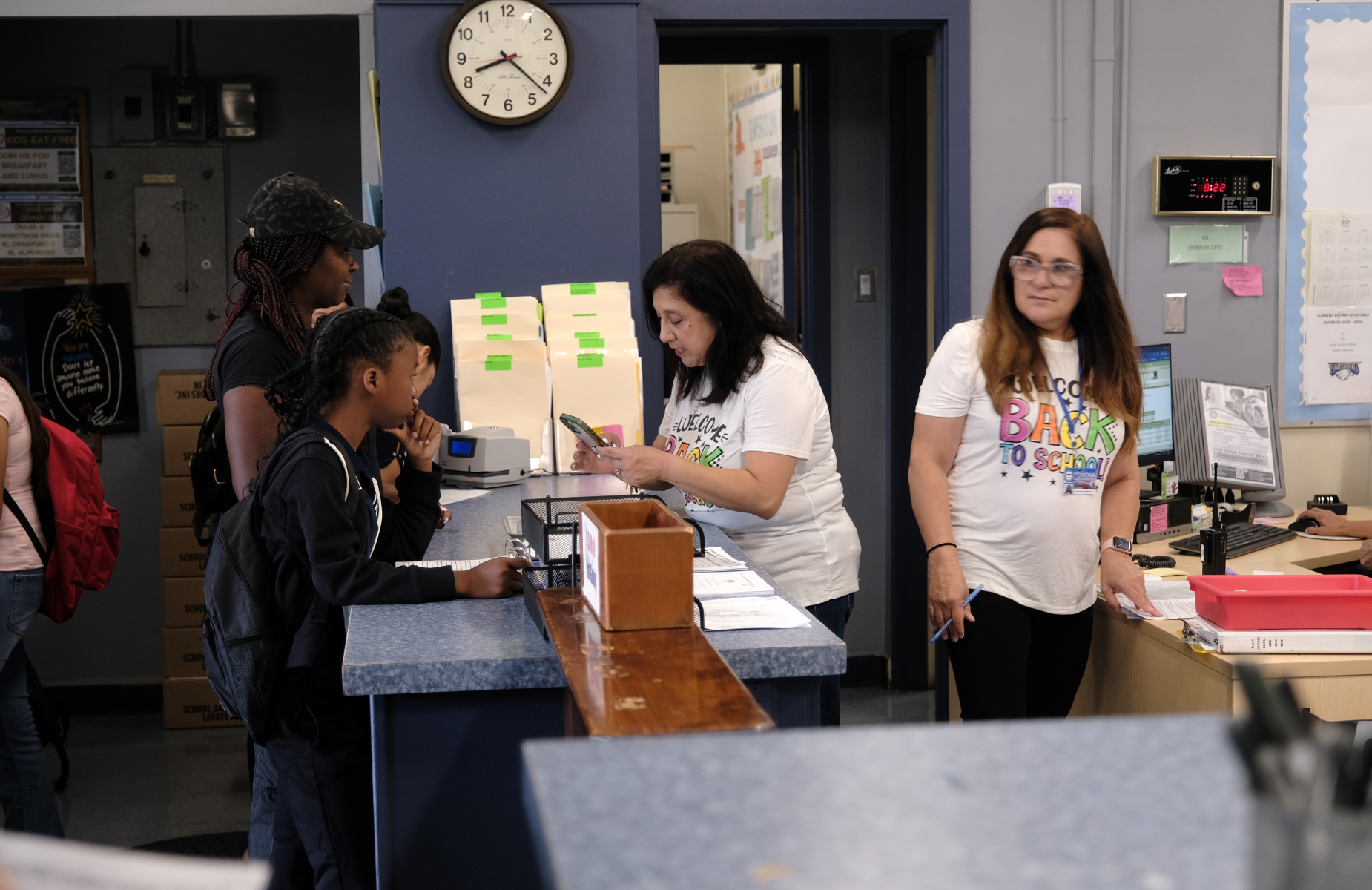 Emerson Middle School Staff help students on their first day of school
