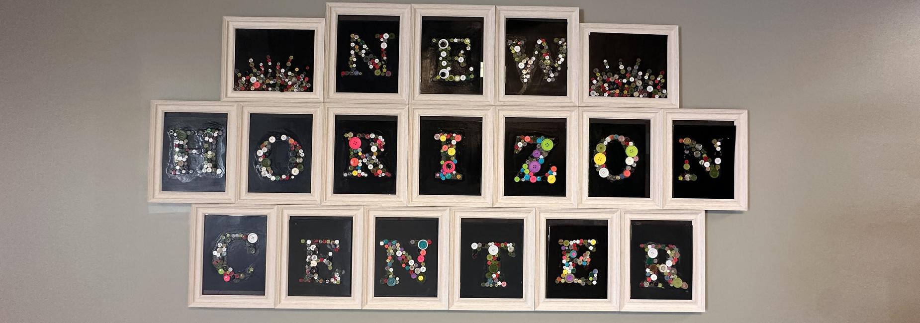 Colorful wall decor spelling 'New Horizon Center' with various buttons.