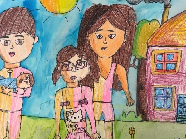 A colorful drawing of a family with a house, sun, and trees.