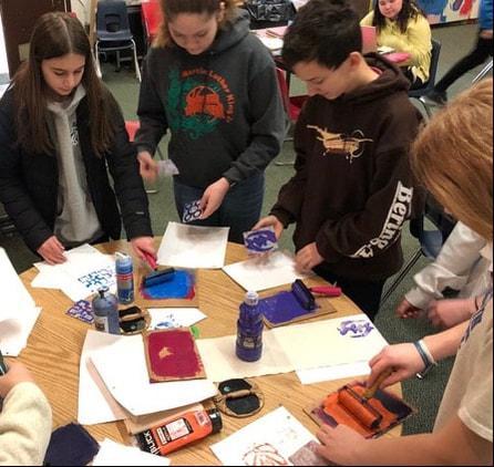 students working on art project