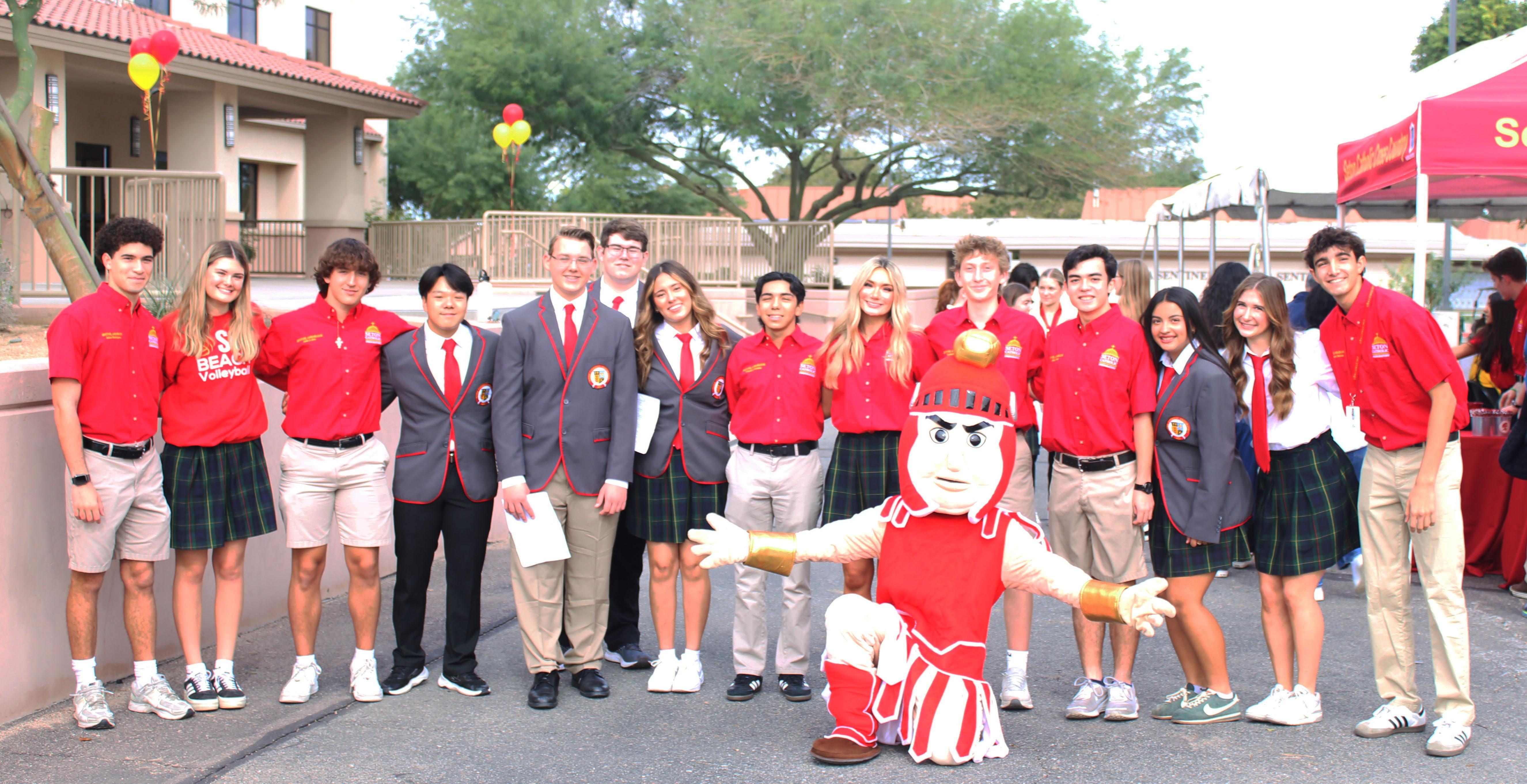 Students with Sentinel in front