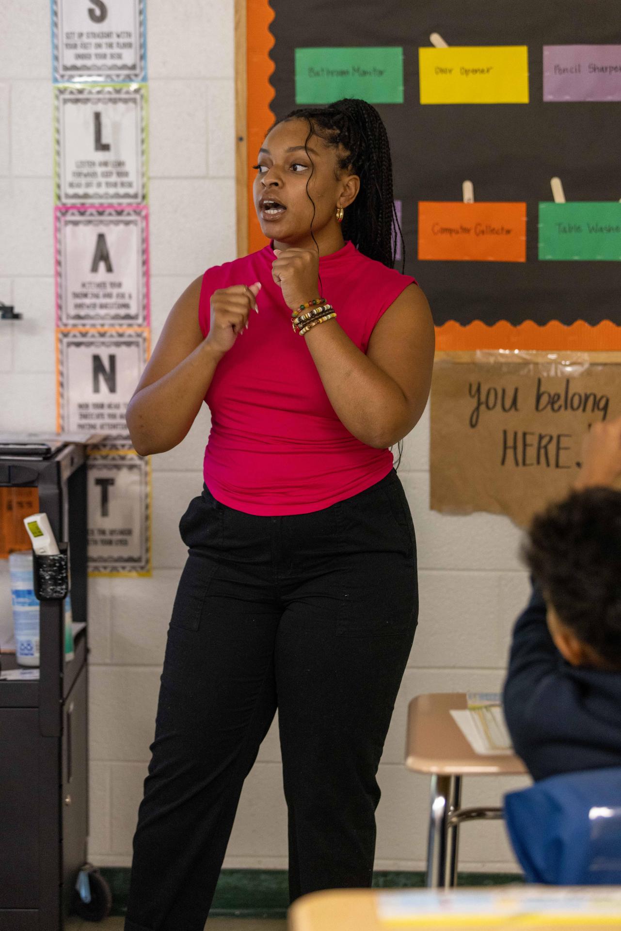 A teacher leads the class