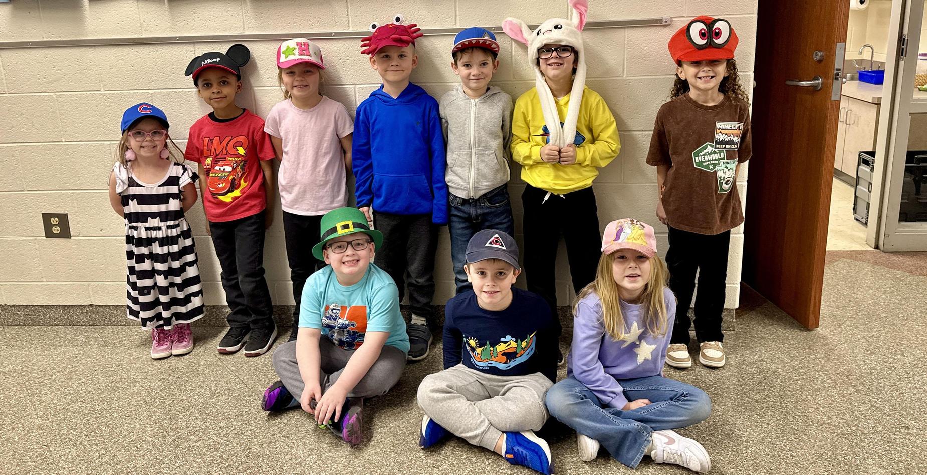 Kindergarten classes at Dr. Julian Rogus School celebrated Dr. Seuss's birthday by wearing hats and reading The Cat in the Hat!
