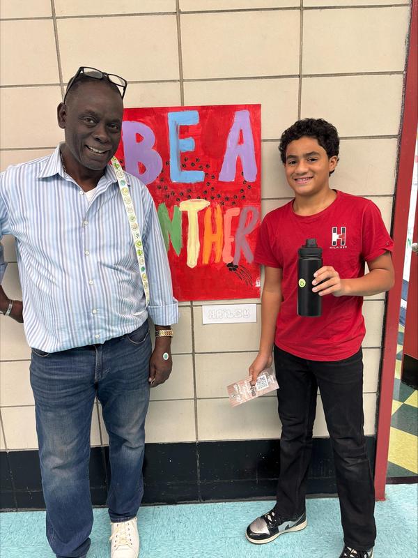 Student and teacher with a reusable bottle