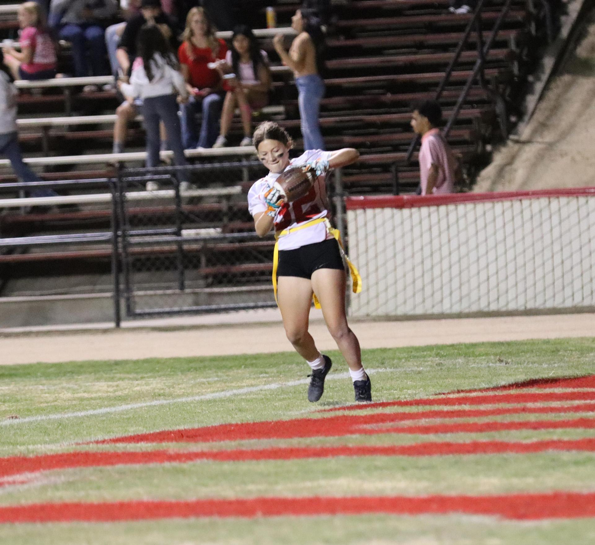 girls playing flag football