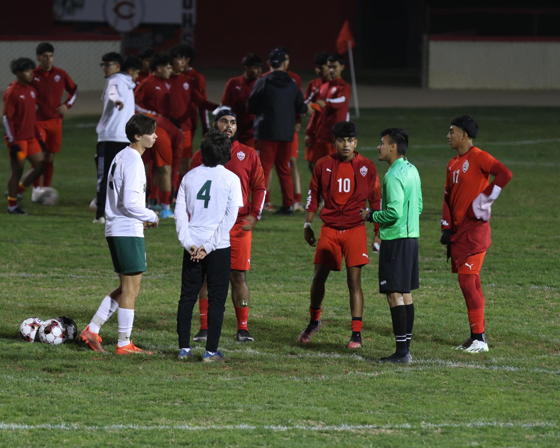 Varsity boys play soccer against Kingsburg