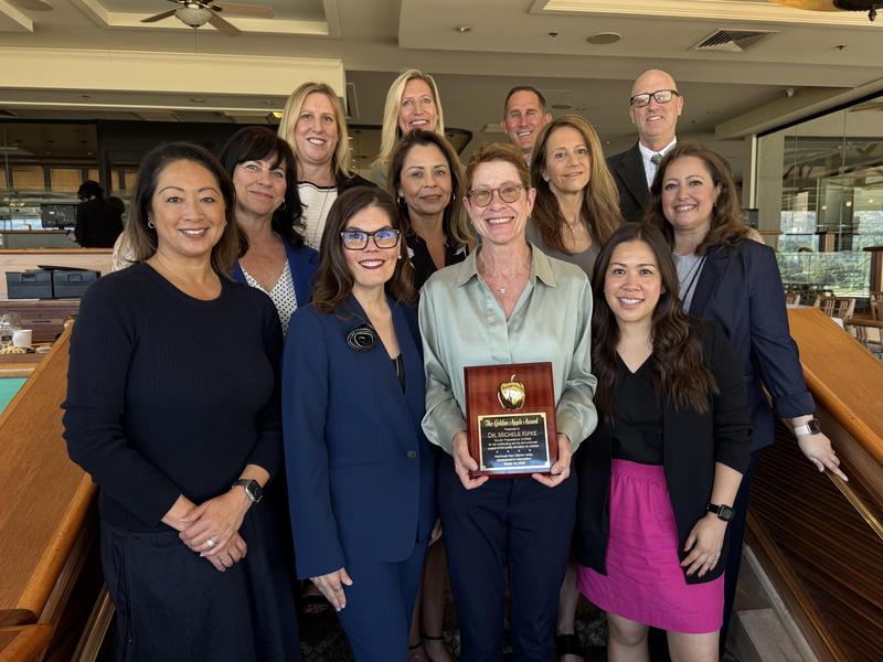 Dr. Michele Kipke (center) and South Pasadena Unified School District representatives celebrated Dr. Kipke receiving the Golden Apple Award for Volunteerism. (Photo Courtesy of South Pasadena Unified School District)