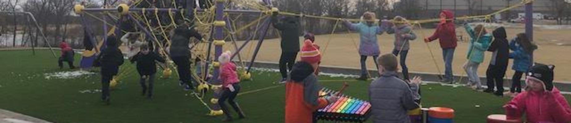 Students enjoying new PS Playground