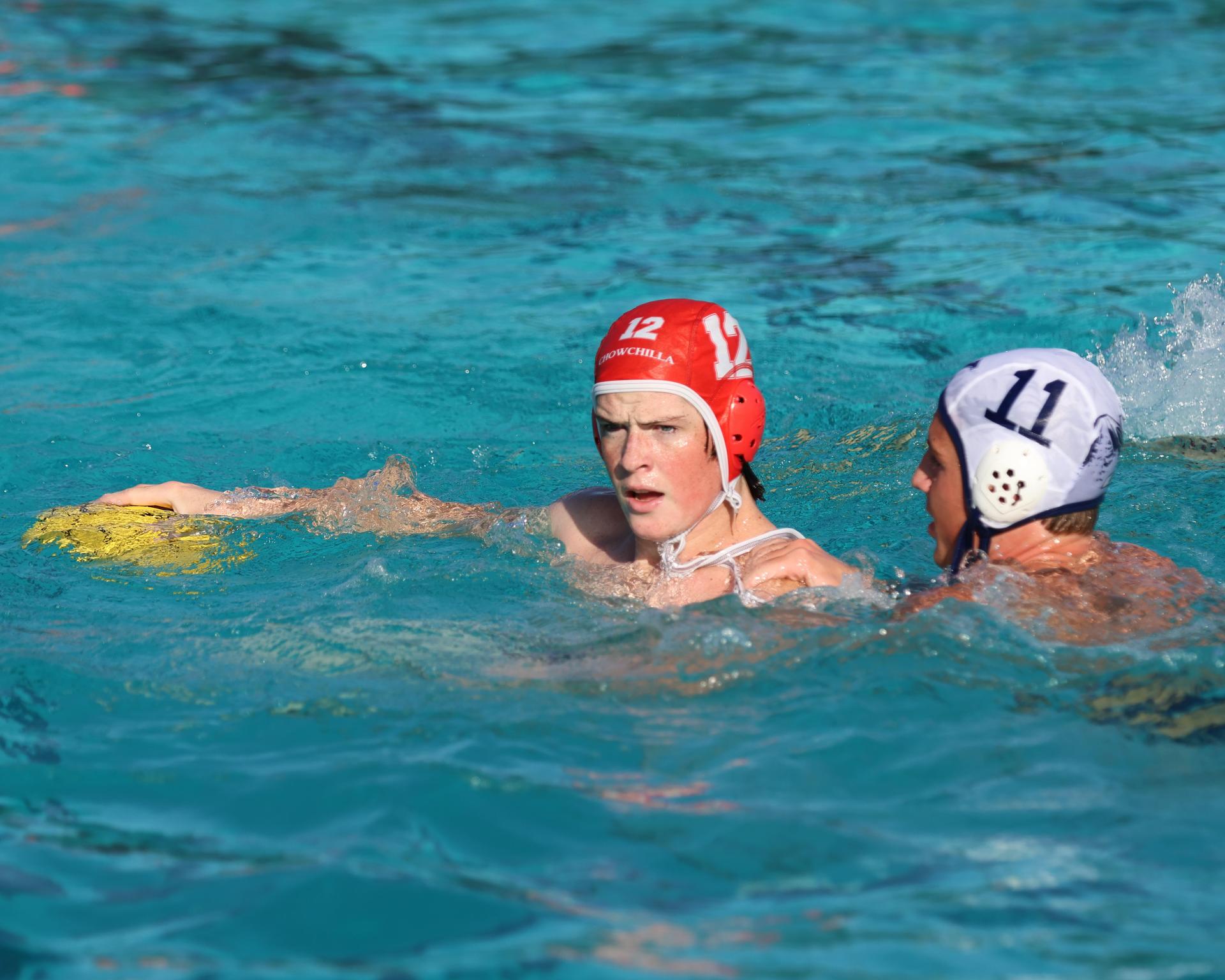 Boys playing water polo against Yosemite