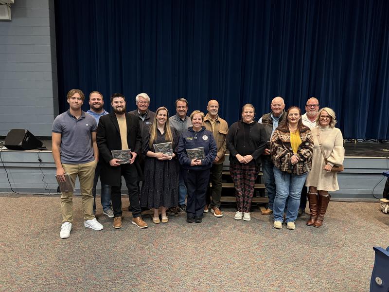 Adults standing and posing