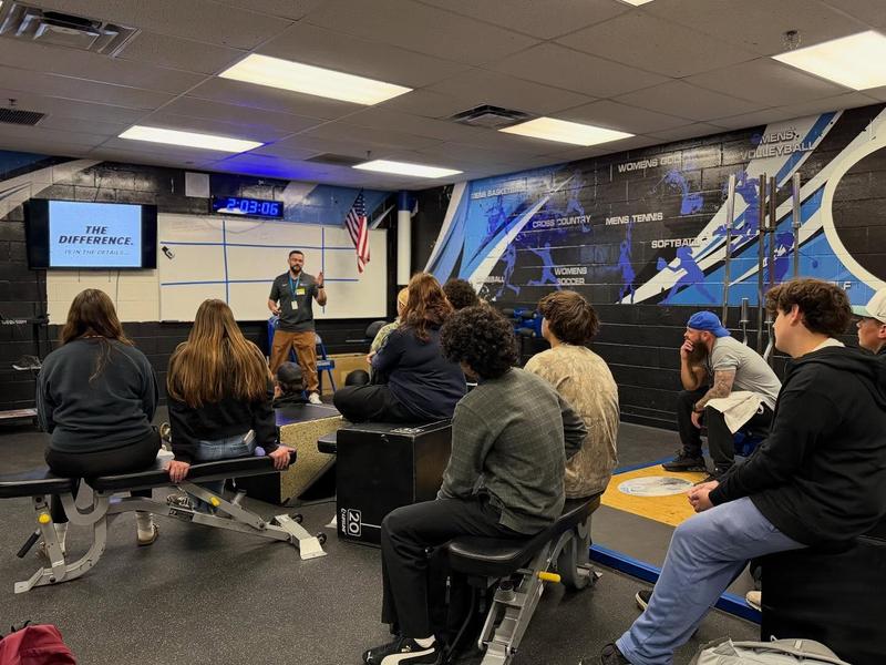 students listening to a speaker