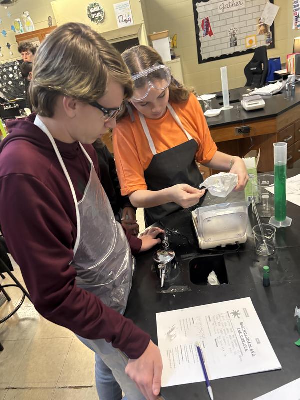 boy and girl doing lab