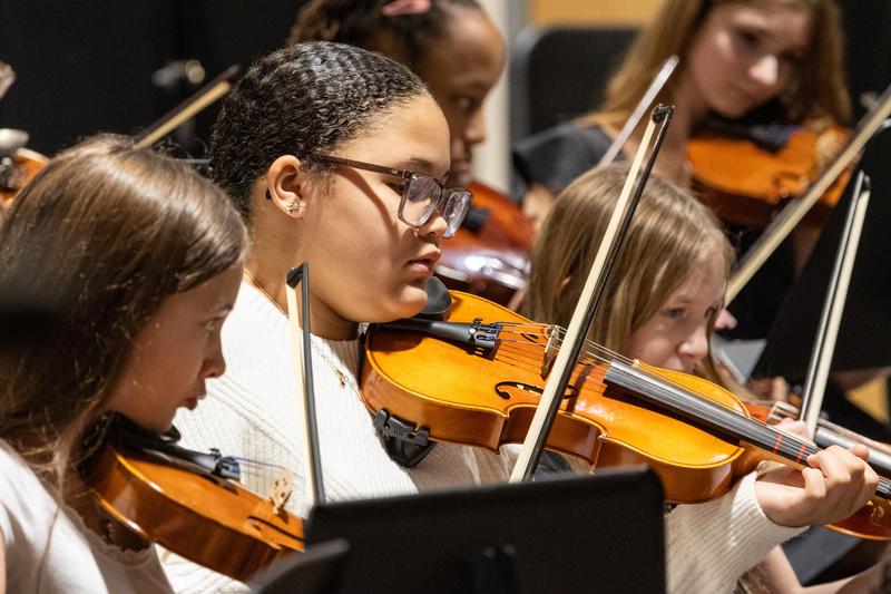 The 6th grade orchestra performs