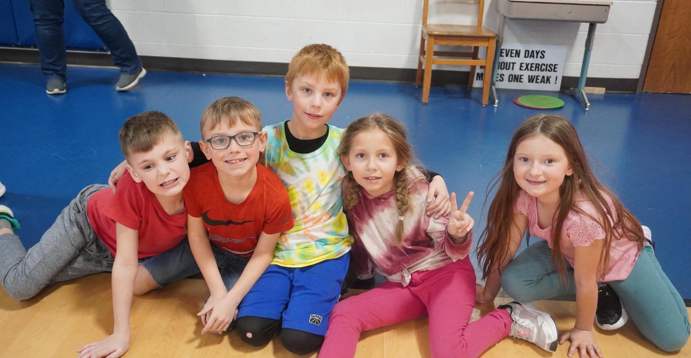 A group of five students wait their turn to jump rope at the annual Kids Heart Challenge event.
