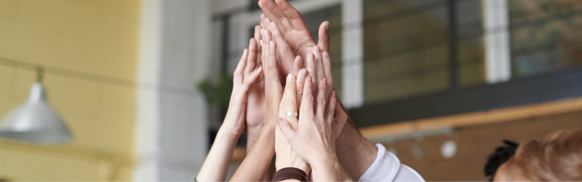 A group of hands grouped together