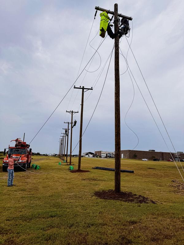 Lineworkers on pole