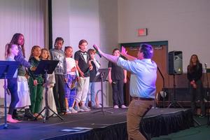 Lower schooler Preforming on Flutes During Talent Show