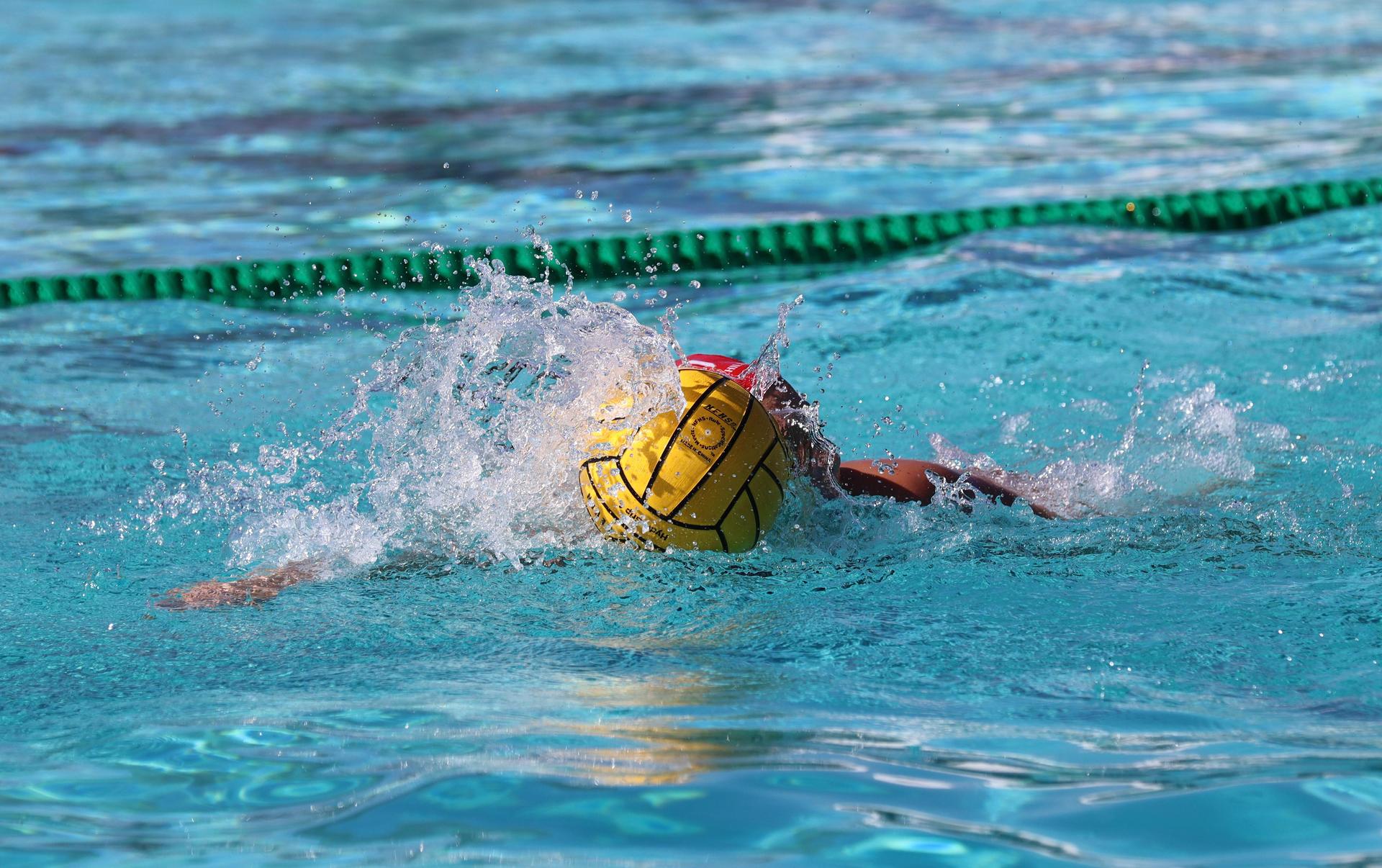 girls playing water polo against Hoover