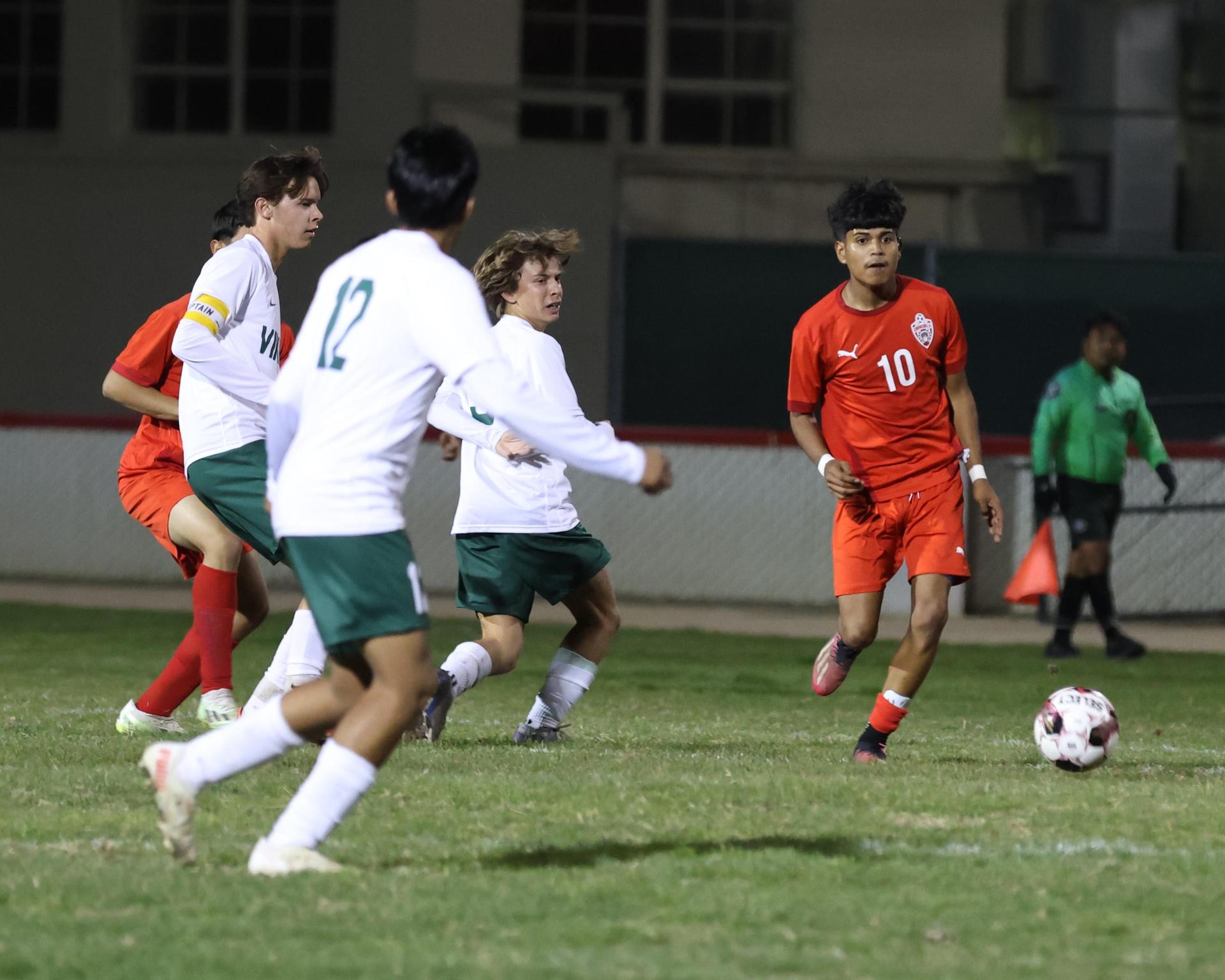 Varsity boys play soccer against Kingsburg