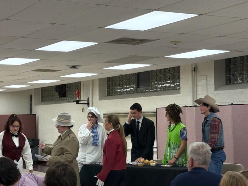 Harris questions the siblings and staff