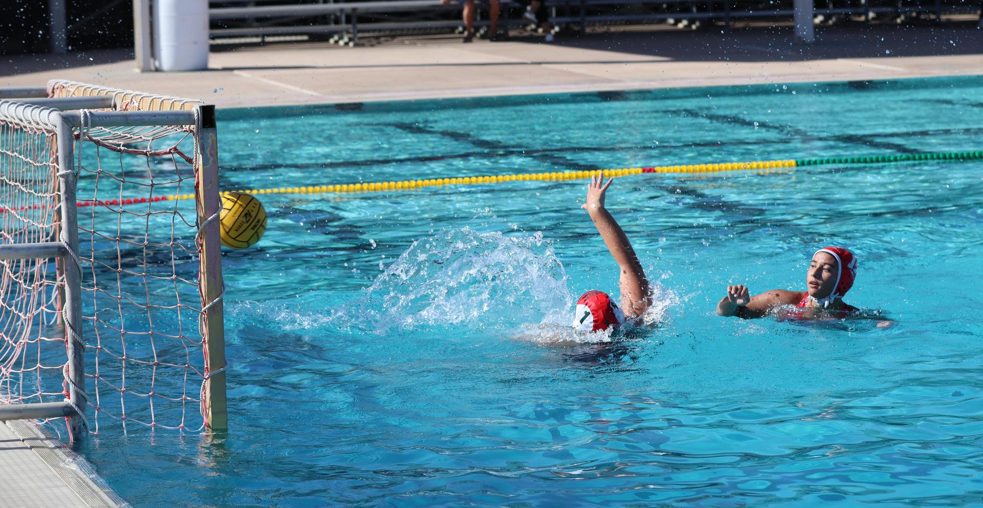 girls playing water polo against Hoover