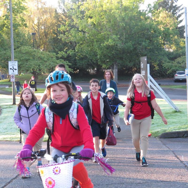 Students at Arco Iris Spanish Immersion School walk and ride their bicycles to school.