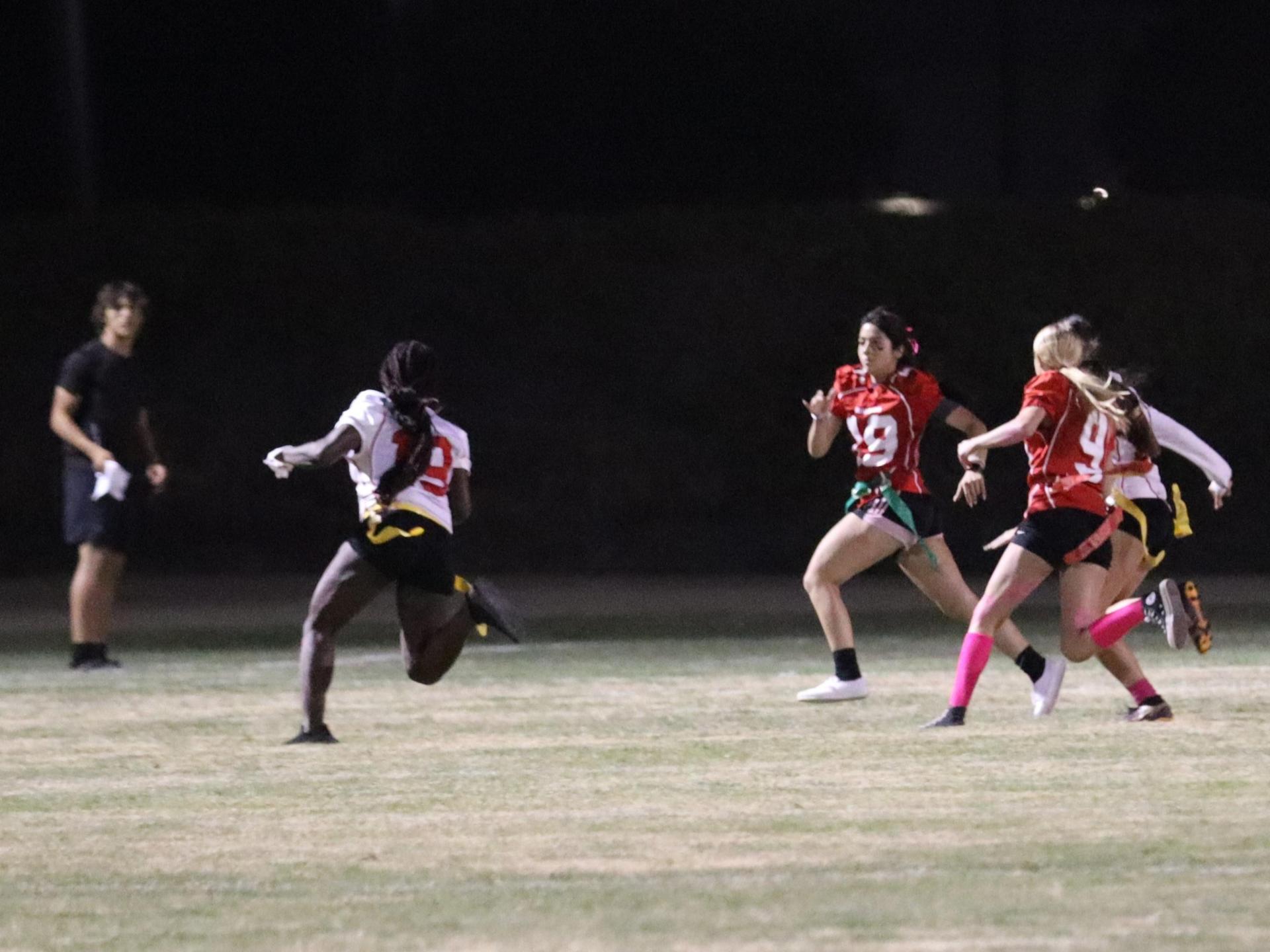 girls playing flag football