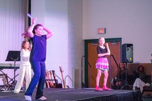 Lower schoolers dancing during the talent show