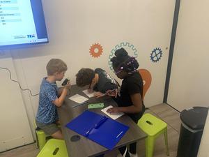Students build a catapult in the Texas Mobile STEM Lab