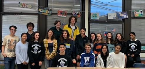 Photo of Westfield High School students in Comparative Religions class creating graphic designs promoting tolerance.