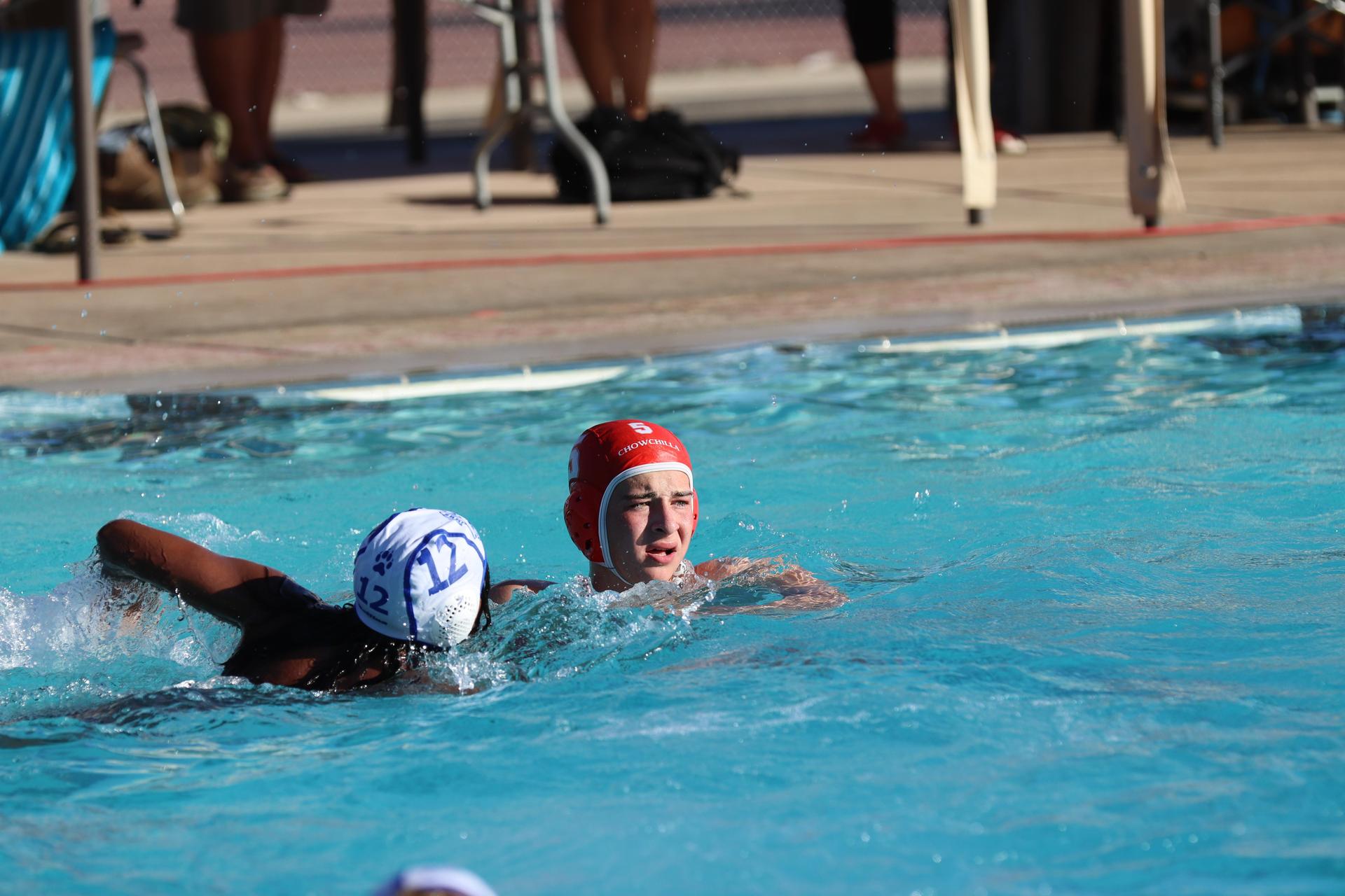 boys playing water polo against Madera