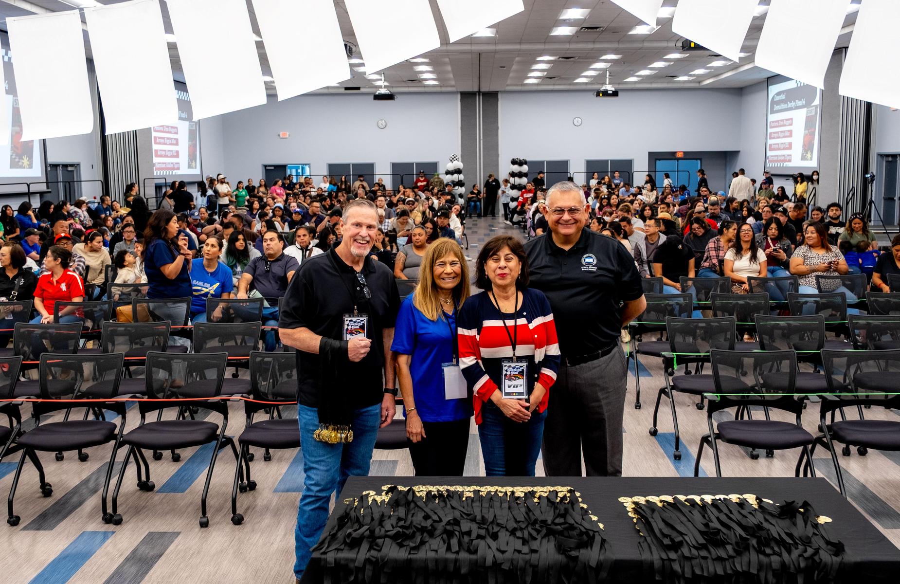 board cabinet, and Darren at Tournament of Robots with parents