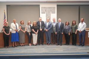 The Temple ISD Board of Trustees poses with representatives of Baylor College of Medicine and Baylor Scott & White