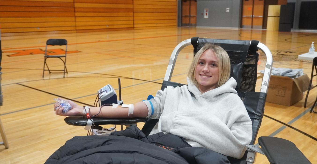 A TKHS student donates blood during an annual blood drive sponsored by the National Honor Society.