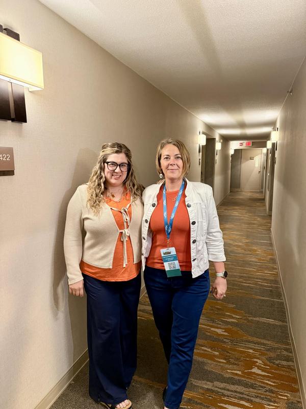 Smiling teens dressed in professional attire