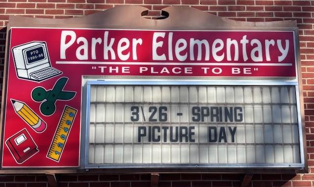 Sign for Parker Elementary announcing Spring Picture Day.