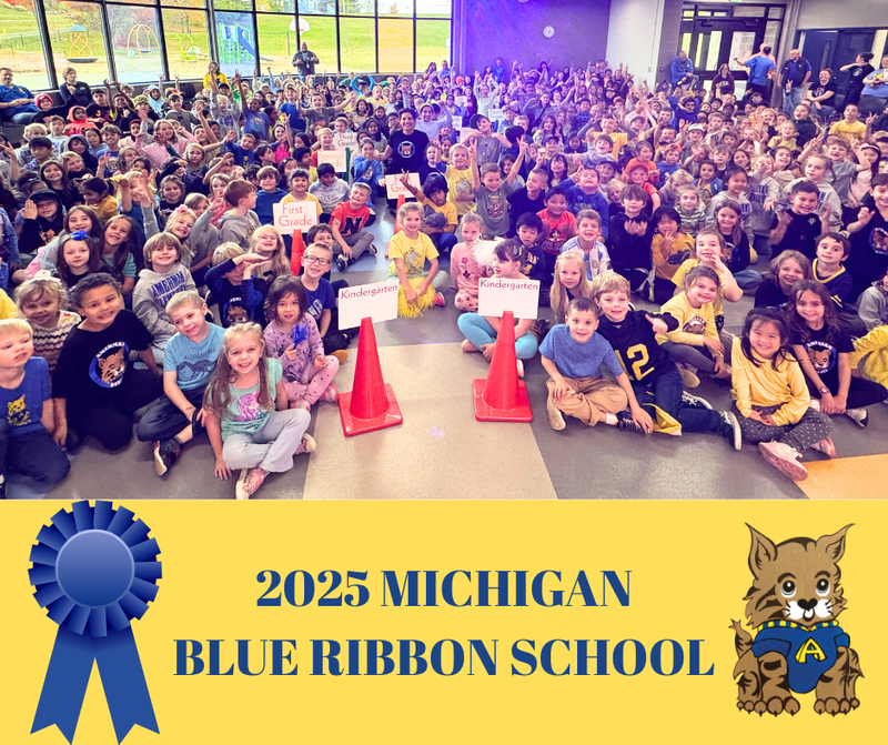 Picture of students sitting on the floor.