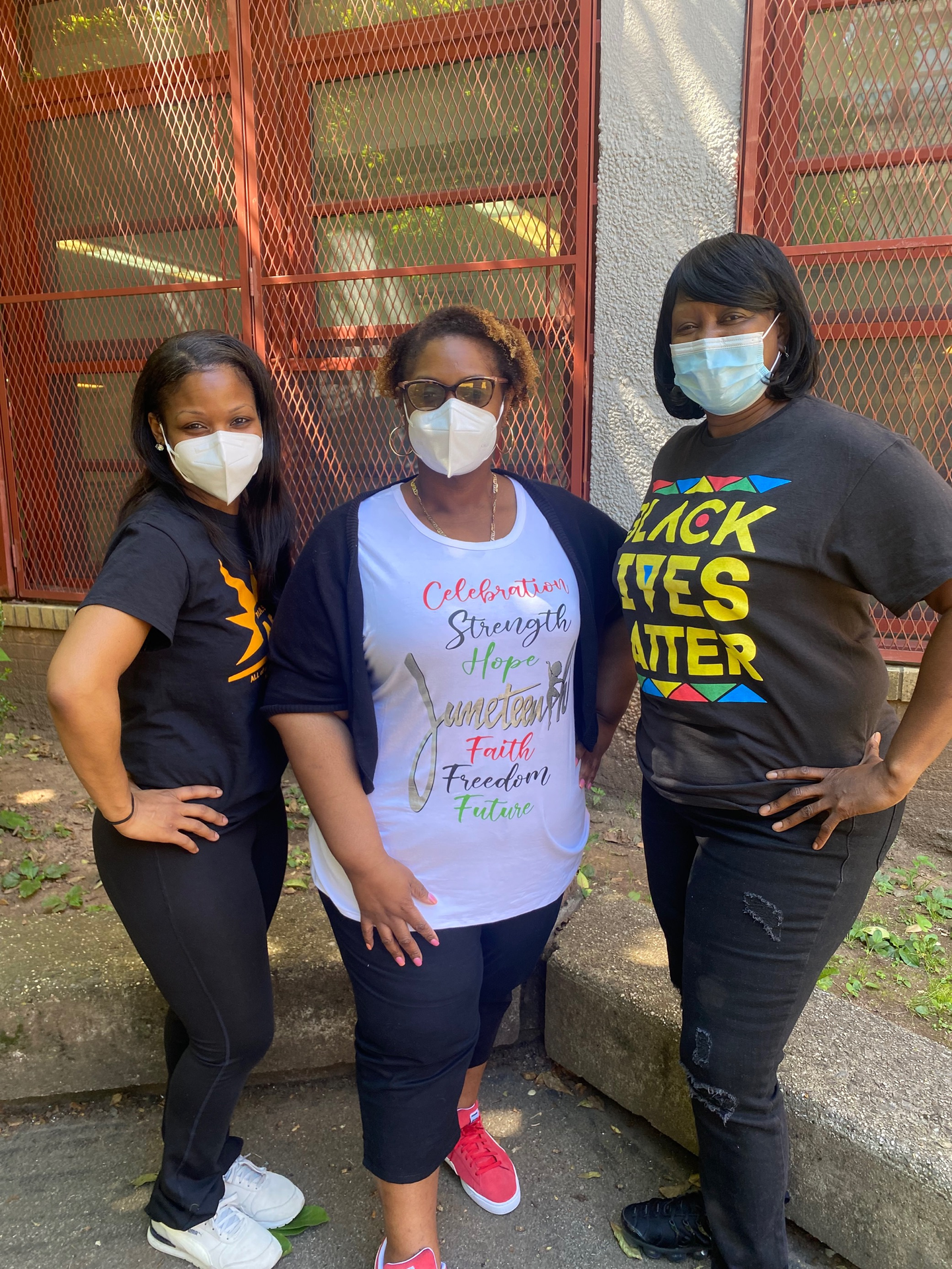 Principal Marshall, AP Witherspoon, and AP Augustin representing colors for Juneteenth