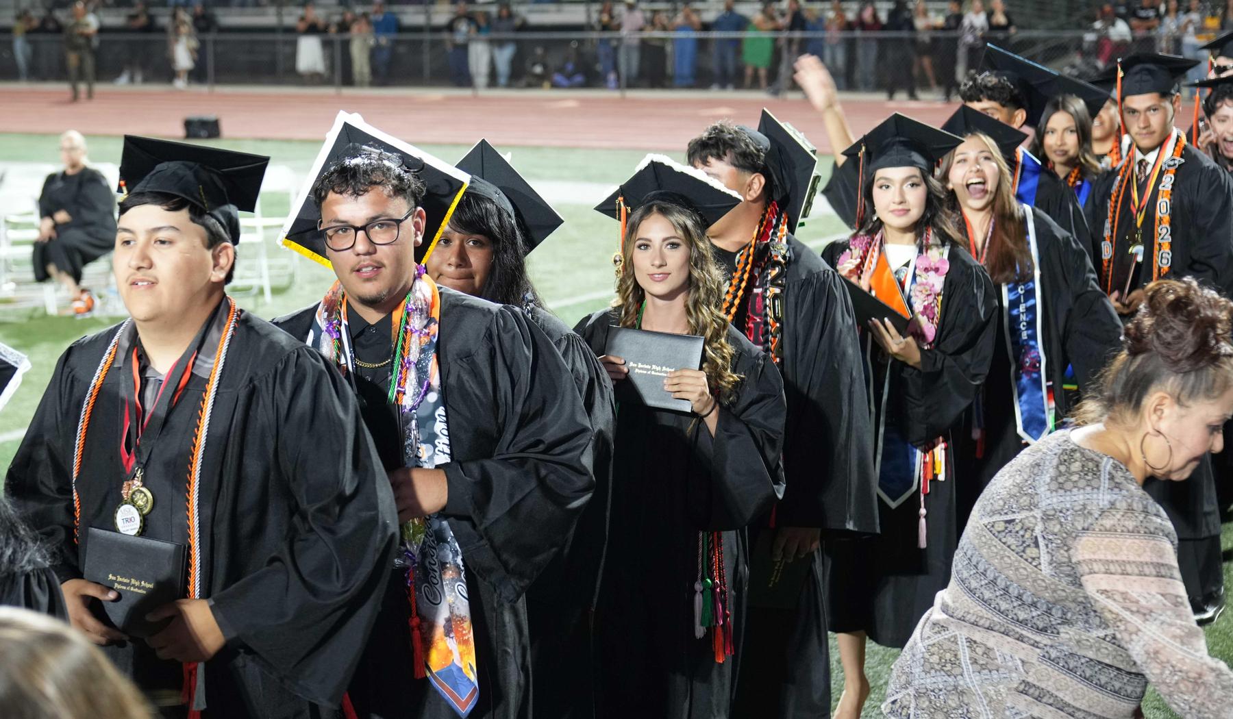 SJHS graduates lining up to receive diploma