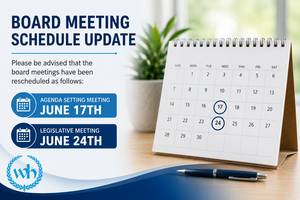 Board Meeting Schedule Update graphic from Woodland Hills School District displaying revised meeting dates. The Agenda Setting Meeting is scheduled for June 17 and the Legislative Meeting is scheduled for June 24. The graphic features a desktop calendar with the dates highlighted and the Woodland Hills logo in the lower left corner.