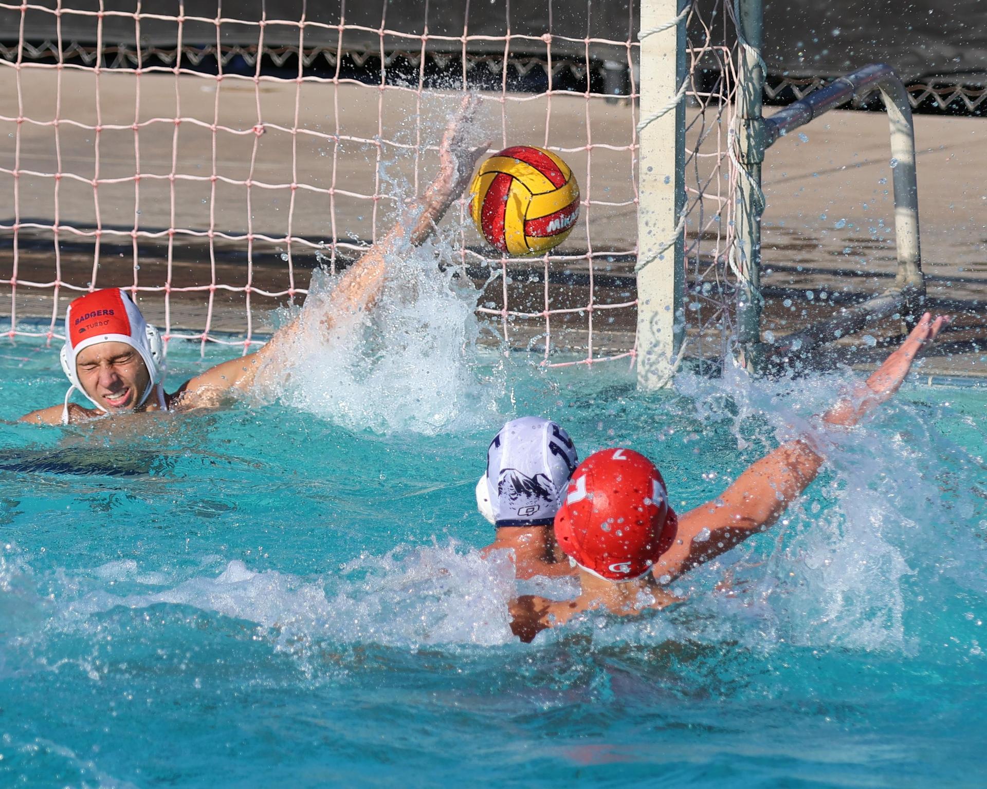 Boys playing water polo against Yosemite