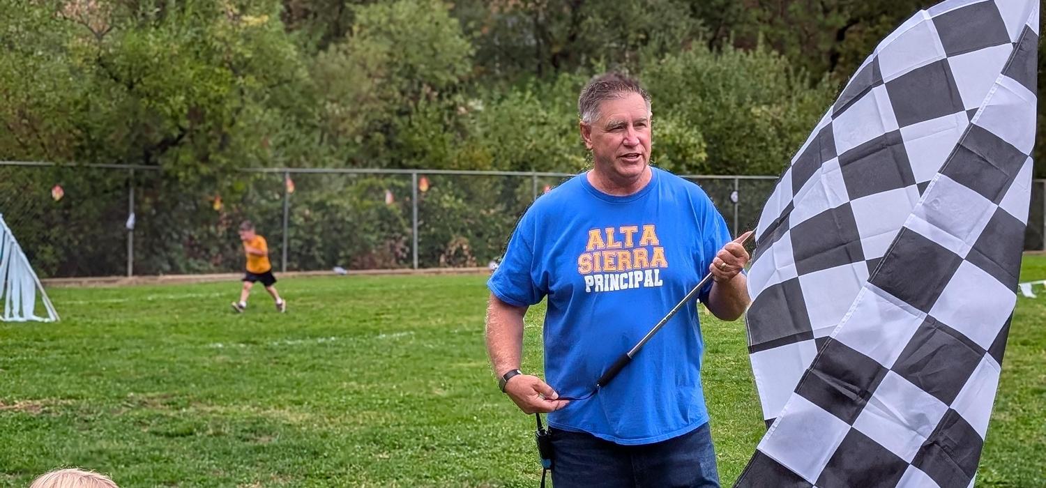 Principal Bivens at Alta Sierra's PTC Jog-A-Thon