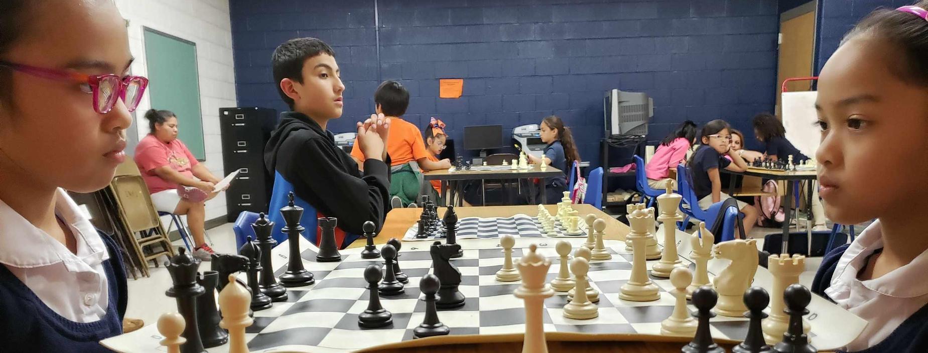 Students preparing for Chess Tournament during ACE Parent Open House