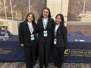 Smiling teens dressed in professional attire