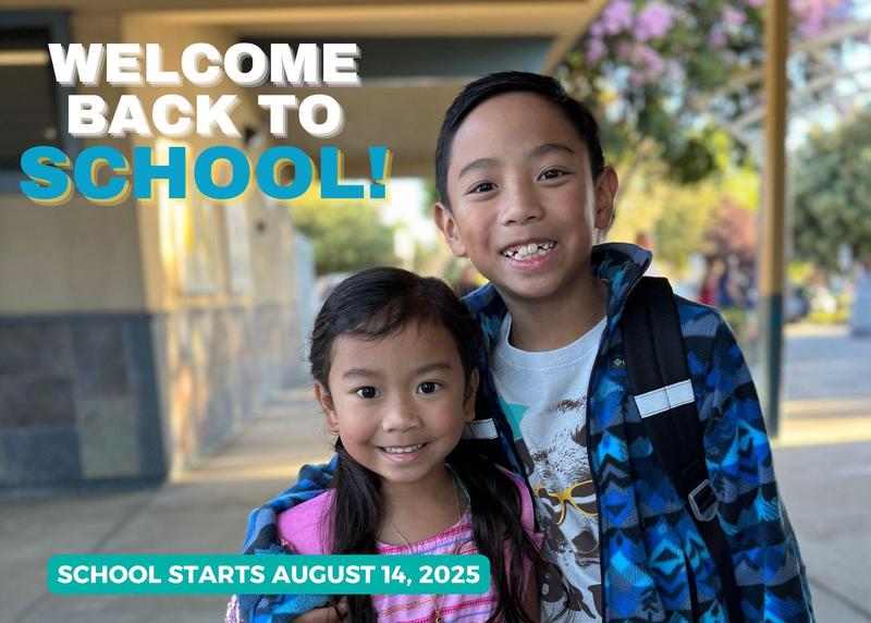 Two students wearing backpacks