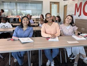 Three girls at table