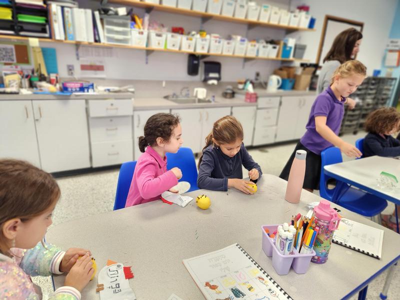 Students hard at work creating Pomanders.