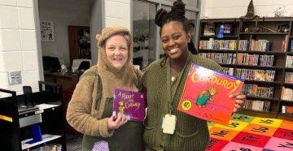 Teachers dressed up as book character